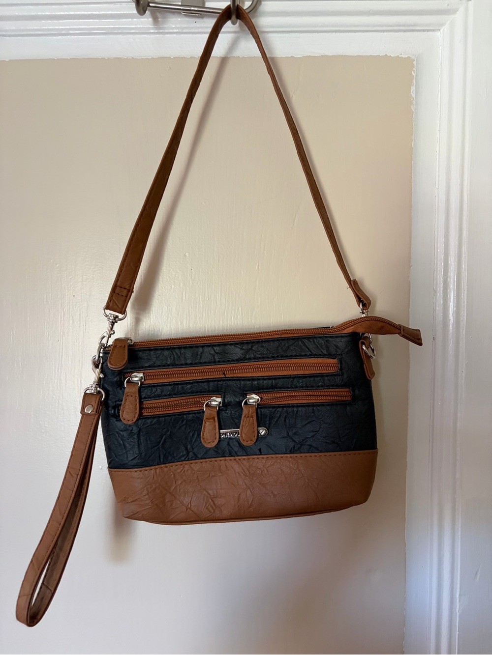 Stone Mountain Two-Tone Black and Brown Crossbody Bag with Wristlet Strap